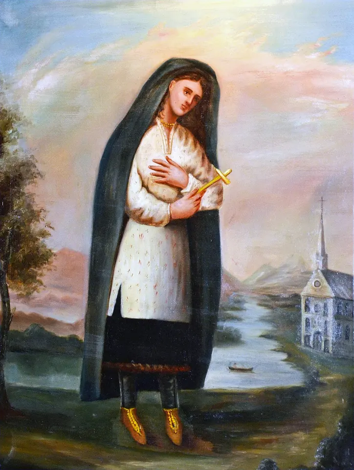 Nineteenth-century painting of Kateri in a dark mantle holding a small cross, with a river, a canoe and a white church with a steeple behind her