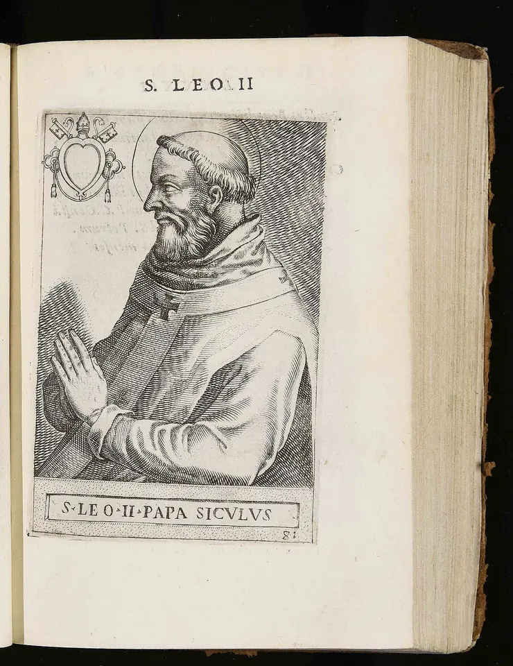 Old book open to an engraved profile portrait of a bearded pope with his hands joined in prayer, labeled S. Leo II Papa Siculus