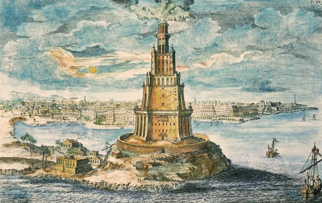 Colored engraving of the great lighthouse of ancient Alexandria on its island, with the walled city along the shore and ships in the harbor