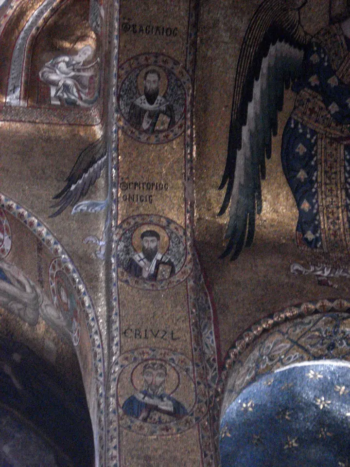 Gold mosaic arch with a column of round medallions, each holding the bust of a bearded bishop saint with a Greek name inscribed beside him