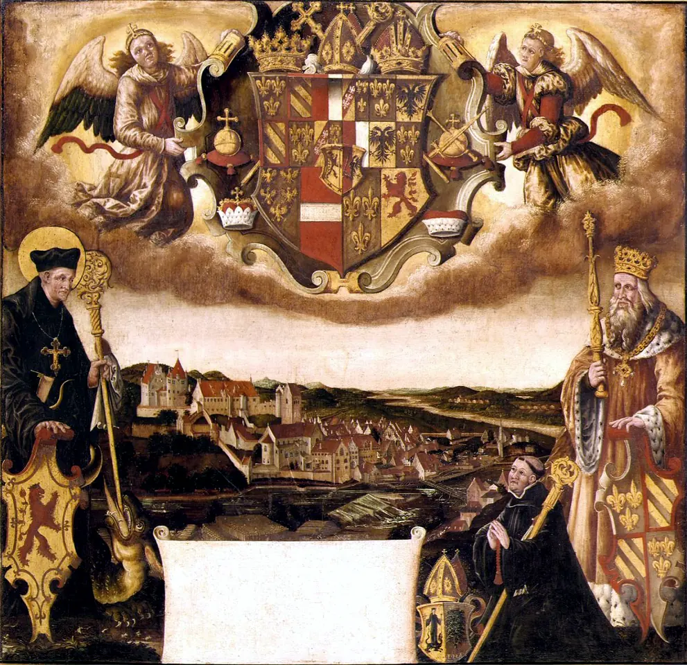 A painted panel with the coats of arms of benefactors carried by angels above a view of Füssen and its abbey; at left St. Magnus with his staff and a dragon, at right King Pippin with a crown and scepter