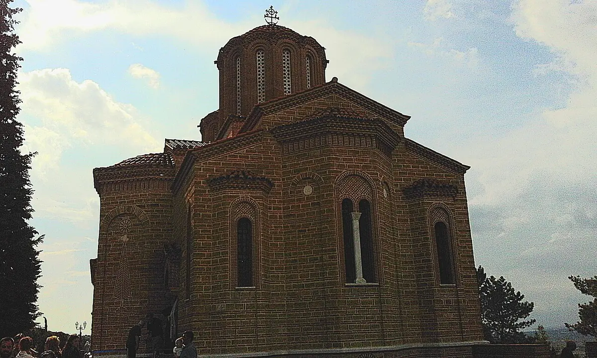 A Byzantine-style church of brick and stone with a central dome, at the Souroti monastery