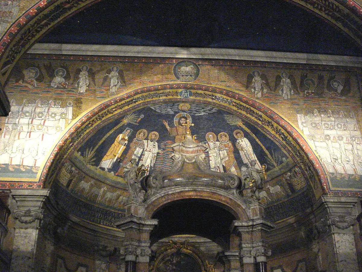 The mosaic apse of Santa Prassede, with Christ on the clouds between saints in white above a band of lambs, and crowds of the blessed on the great arch above