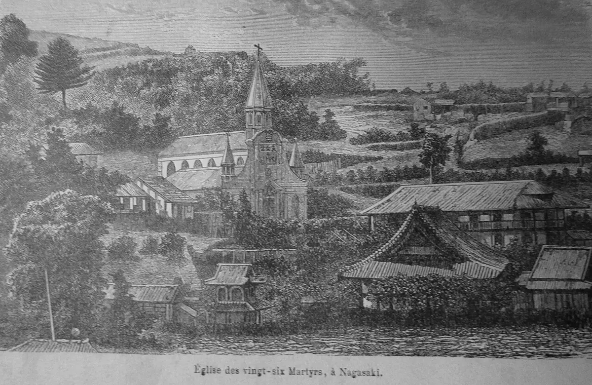 Old engraving of a small Gothic church with a pointed spire on a wooded hillside above Japanese tiled-roof houses