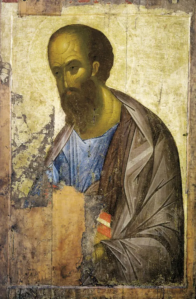 Russian icon of St. Paul with a high bald forehead and dark pointed beard, in a blue tunic and gray-brown cloak, holding a red-bound book, on a worn gold ground