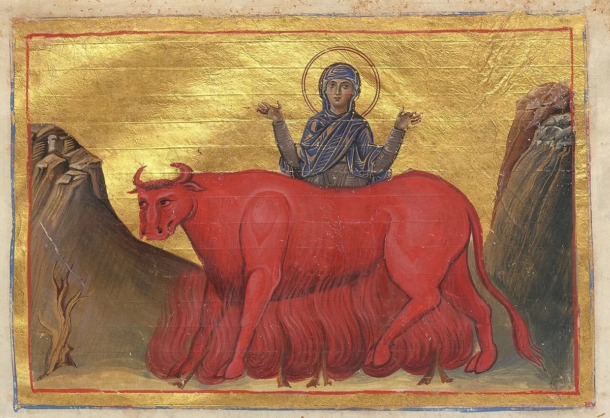 A Byzantine manuscript miniature on a gold background of a haloed young woman in a dark veil raising her hands in prayer above a large red bull, with flames below and rocky hills on each side