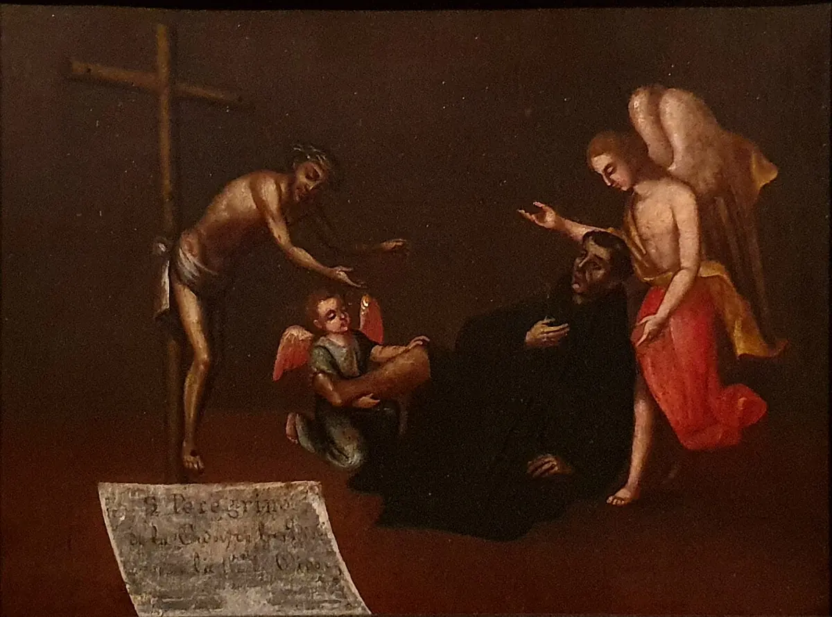 Colonial painting of Christ leaning from a tall cross toward a friar in black lying on the ground, with an angel in red and a small winged child at his feet