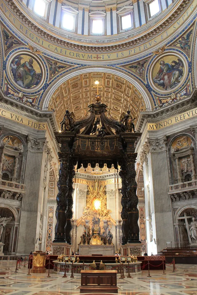 View down the nave of St. Peter's toward Bernini's bronze canopy and, behind it, the gilded bronze throne of the Chair of Peter under a golden glory with a window of the Holy Spirit