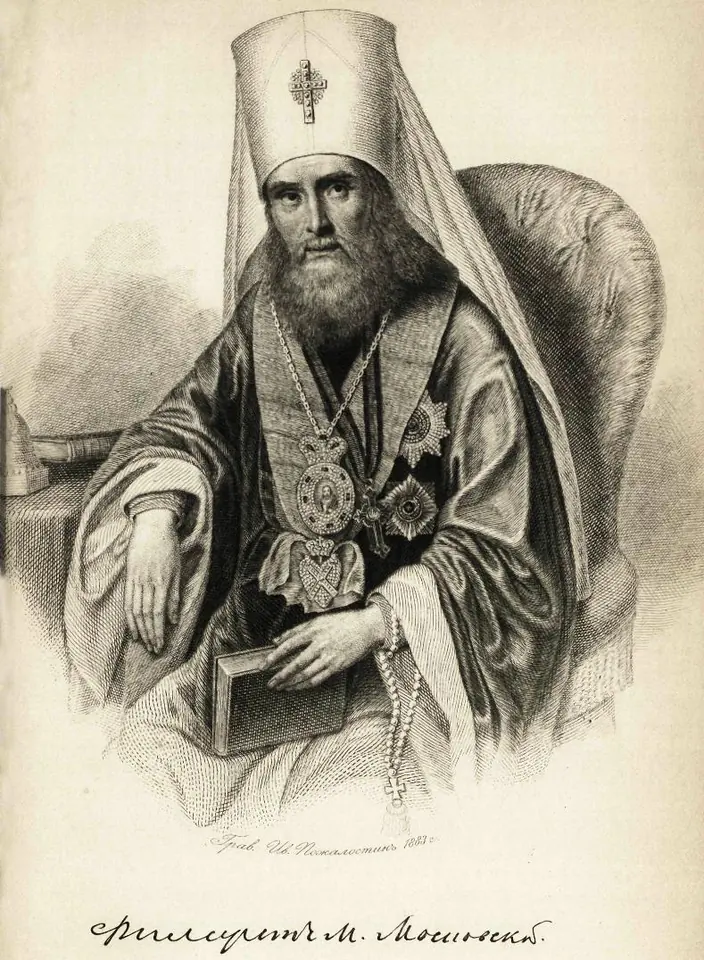Black-and-white engraving of a bearded bishop in a white hood, seated in an armchair with a book on his knee and a panagia and orders on his chest