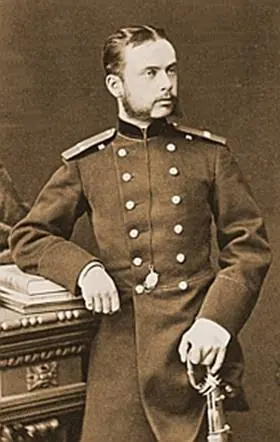 Sepia photograph of a young officer with a mustache and short beard in a double-breasted uniform, leaning on a table with his hand on a saber hilt