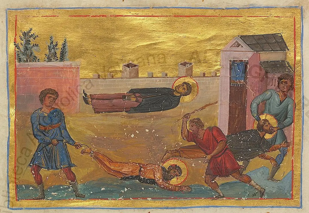 Byzantine manuscript miniature on a gold ground showing a haloed monk dragged by the feet before a city wall while men beat other haloed figures with clubs
