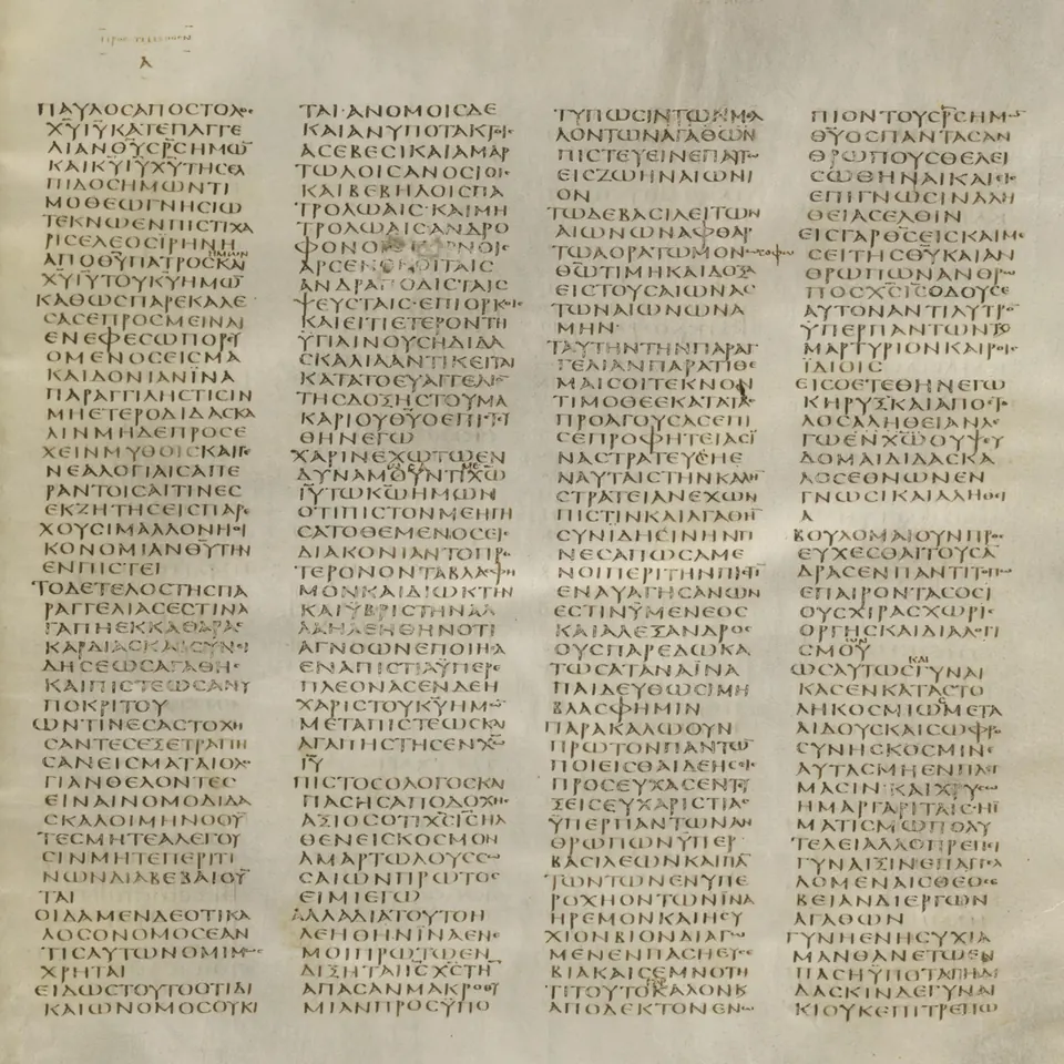 Page of an ancient Greek Bible manuscript written in four narrow columns of capital letters on pale parchment