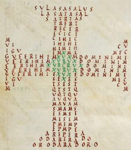 A page of medieval capital letters arranged in a grid, with letters picked out in red and green to form a cross shape