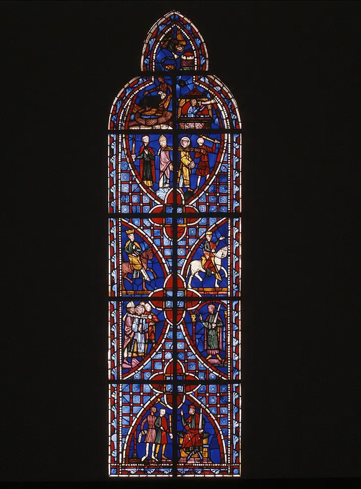 A tall Gothic stained-glass window of red and blue medallions, each showing a small scene from the story of St. Vincent and his relics