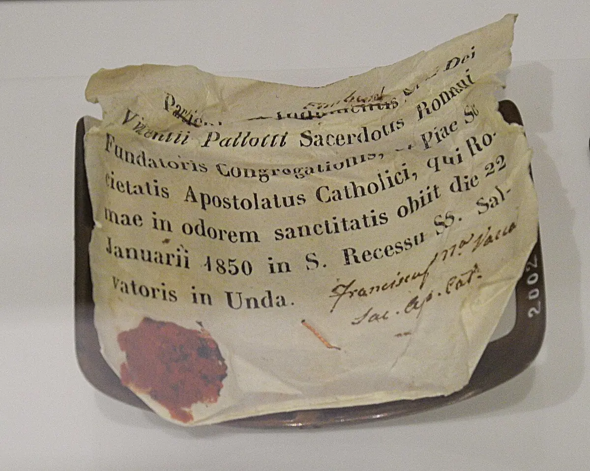 An old handwritten Latin label with a red wax seal, recording that Vincent Pallotti died in the odor of sanctity on January 22, 1850, at San Salvatore in Onda