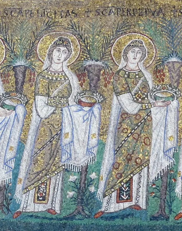 Byzantine mosaic of two crowned women in jeweled white and gold robes, each carrying a crown in veiled hands, standing between palm trees under the lettered names of Felicity and Perpetua
