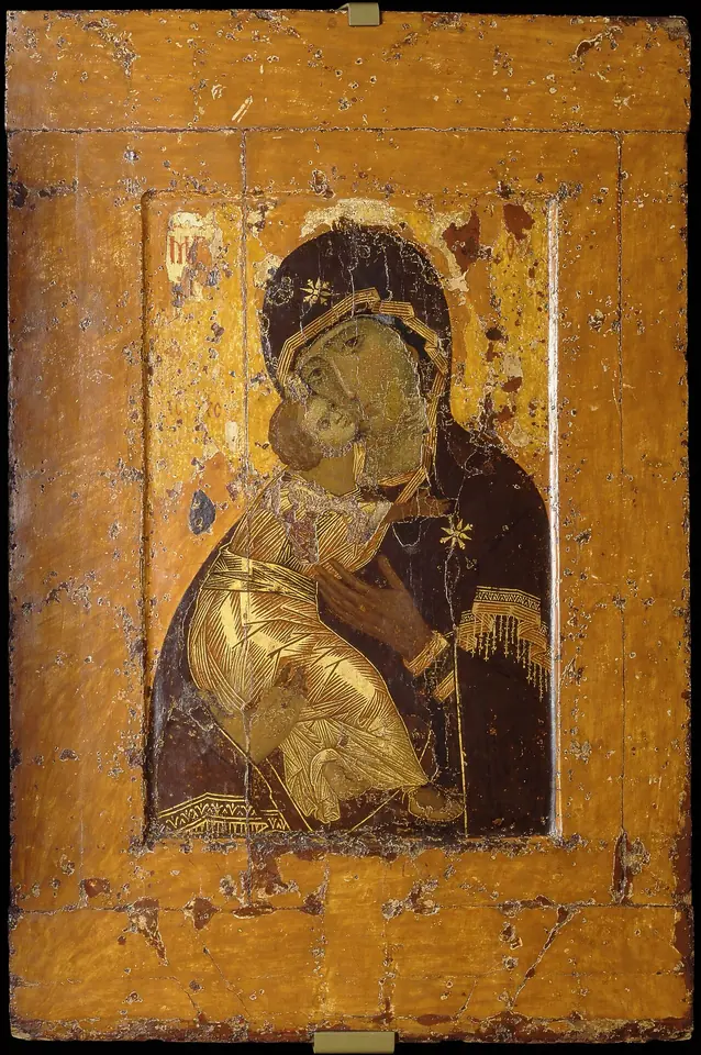 Byzantine icon of the Virgin Mary in a dark mantle holding the Christ Child, who presses his cheek against hers and puts his arm around her neck