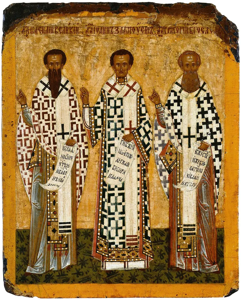 Small Russian icon on gold ground of three bishops standing side by side in white vestments covered with black crosses, holding books and scrolls