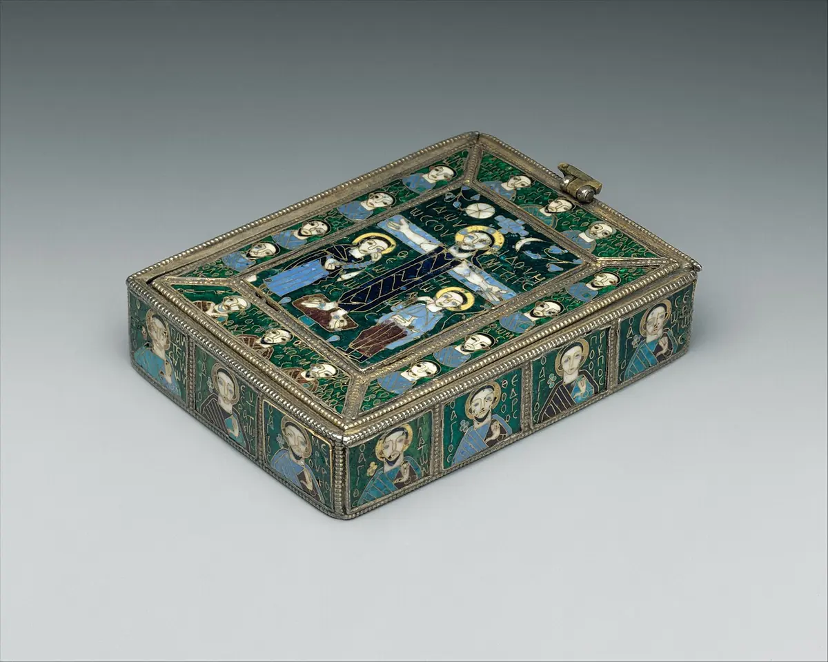 A small rectangular Byzantine box covered with green and blue cloisonné enamel, with the Crucifixion on the lid and saints around the sides
