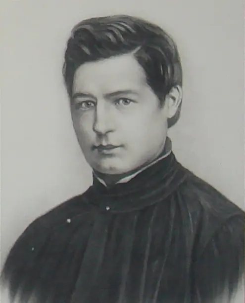 Gray-toned portrait of a young priest with thick dark hair and a high-collared black cassock, looking calmly at the viewer