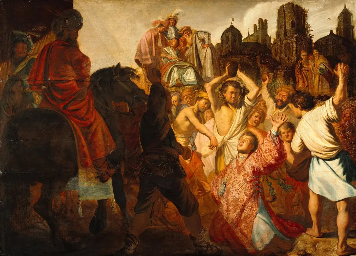 Crowded early Rembrandt painting of St. Stephen in a red deacon's robe kneeling with raised hands as men lift stones above him, with a rider on horseback and a city behind